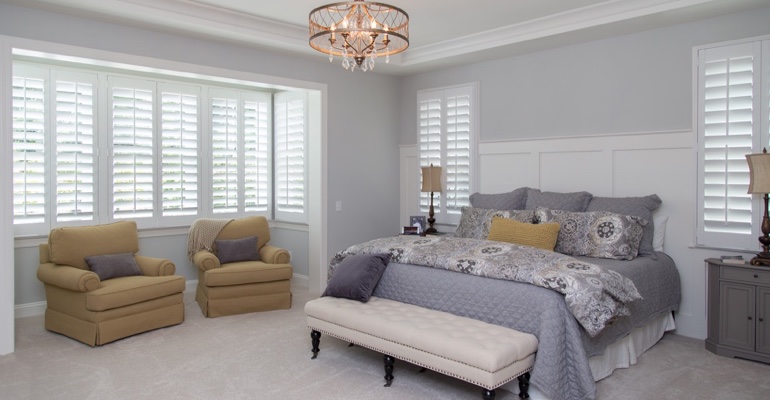 White shutters in Dallas bedroom.